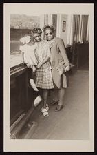 Two Women and a Child in New York Harbor