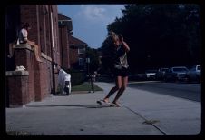 Student skating outside of Cotton Hall