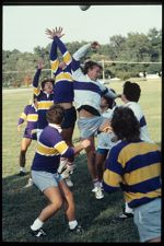 Male students playing Rugby