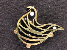 Tar brooch