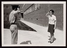  Air Force ROTC Captain and cadet Martha Van Hoy exchange salute