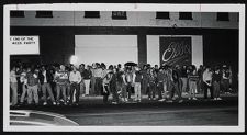 Students waiting outside Elbow Room on Halloween