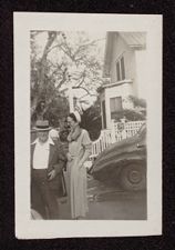James Harvey Morgan and woman beside house