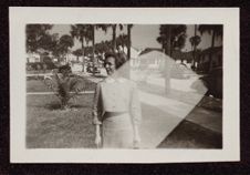 Woman with palm trees