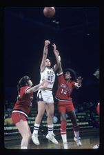 Women's Basketball player shoots