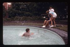 Student falling into Wright Fountain