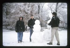 Students building a snowman