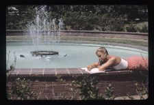 Student doing homework at Wright Fountain