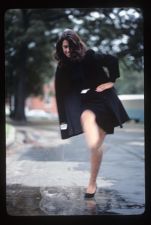 Student kicking puddle