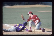 Baseball Team player slides into base