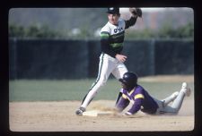 Baseball Team player slides into base