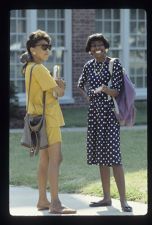 Two women by Flanagan Building