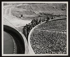 US Army Soldiers Observing Sanitation Filter System 