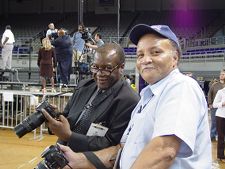 Two members of the press at Barack Obama's presidential campaign rally in Minges Coliseum