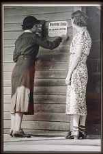 Public health nurse with quarantine sign