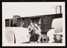 US Army soldiers posed with small artillery piece