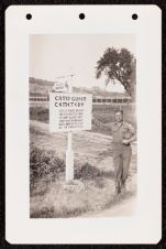 US Army soldier standing beside the Camp Gusen Cemetery