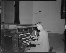 Man playing organ.